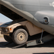 Illustration for article titled Watch Boeings Adorable War-Fighting Golf Cart Fit In A Small Aircraft